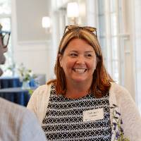 Deborah Sanders smiling at someone off camera